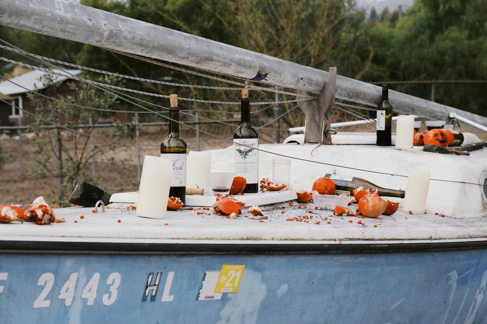 Smashed pomegranates on boat deck